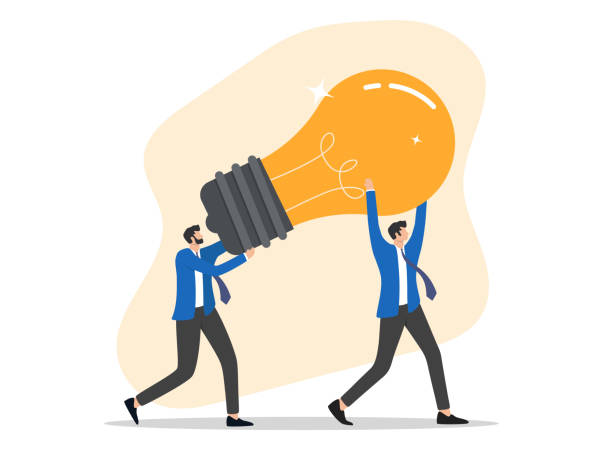 businessman carrying a giant shining lamp
